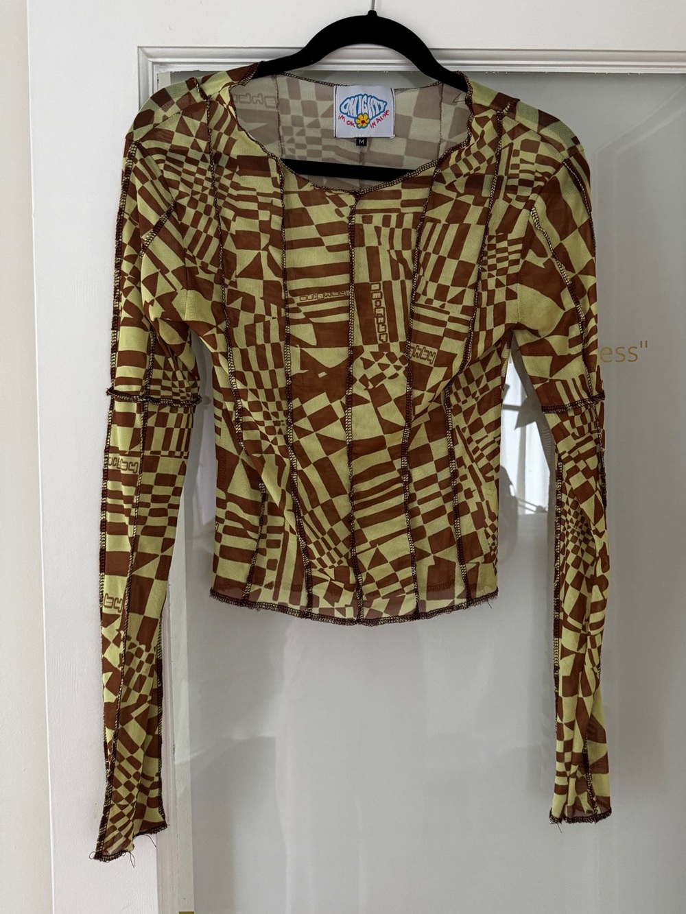 O-MIGHTY Stevie Mesh Long Sleeve Top featuring a green and brown psychedelic geo